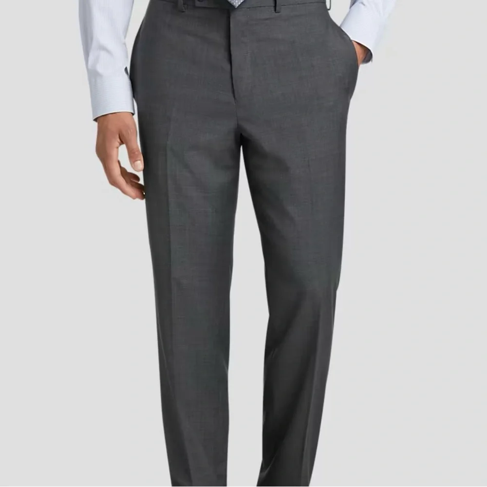 Calvin Klein men’s size 38/30 flat front‎ trousers, grey plaid color